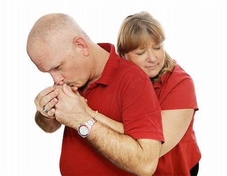 simsearch:400-05234340,k - Mature couple in love.  She's hugging him and he's kissing her.  Isolated on white. Stock Photo - Budget Royalty-Free & Subscription, Code: 400-04011579