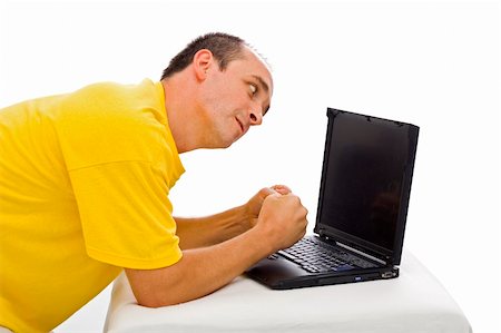 simsearch:400-04971966,k - An angry man attacking the laptop because it doesn't works. Stock Photo - Budget Royalty-Free & Subscription, Code: 400-04011928
