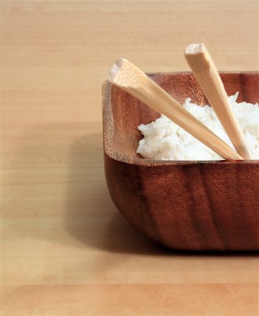 simsearch:400-05297094,k - Bowl of rice with wooden chopsticks. Fotografie stock - Microstock e Abbonamento, Codice: 400-04011956