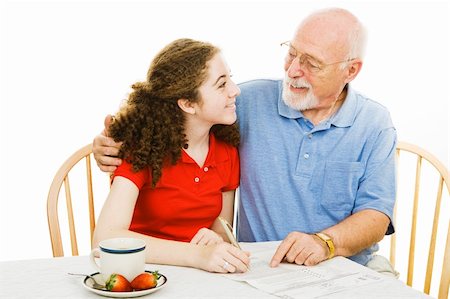 Grandfather offering help and guidance to his teenaged granddaugher.  Isolated on white. Stock Photo - Budget Royalty-Free & Subscription, Code: 400-04012081