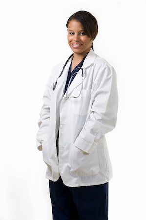 simsearch:400-05172792,k - Female attractive African American doctor with a nose ring wearing white lab coat wearing a stethoscope around shoulders smiling standing on white background Foto de stock - Royalty-Free Super Valor e Assinatura, Número: 400-04012543