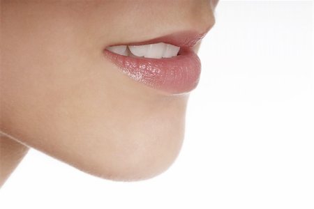 flirt women open mouth - detail of a red made up lip and tooth Stock Photo - Budget Royalty-Free & Subscription, Code: 400-04013078