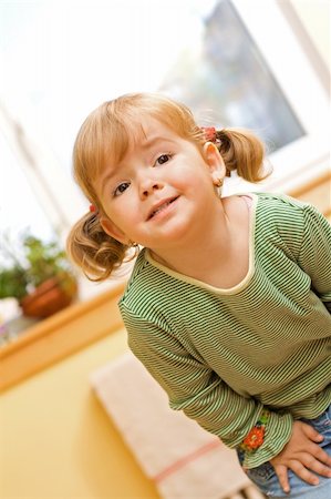 Desperate little girl begging with all her body and mimicry Stock Photo - Budget Royalty-Free & Subscription, Code: 400-04013334