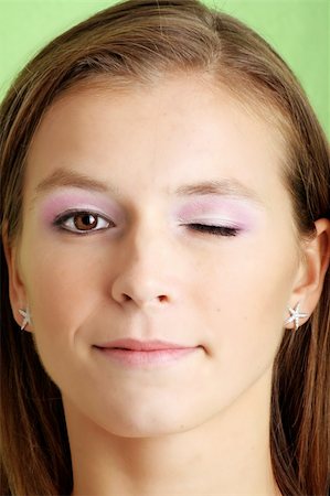 portrait of a young, cheeky woman is winking Stock Photo - Budget Royalty-Free & Subscription, Code: 400-04013380