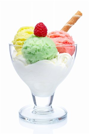 Delicious multi flavor ice cream in glass bowl reflected on white background. Shallow depth of field Foto de stock - Super Valor sin royalties y Suscripción, Código: 400-04013391