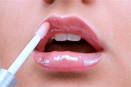 simsearch:400-05676902,k - clse up of a red mouth with lipstick and lip gloss Stock Photo - Budget Royalty-Free & Subscription, Code: 400-04013442