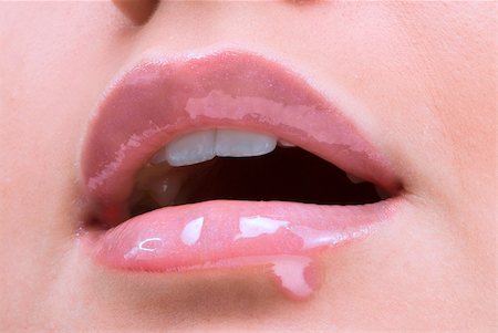 simsearch:400-04446702,k - clse up of a red mouth with lipstick and lip gloss dropping down Foto de stock - Super Valor sin royalties y Suscripción, Código: 400-04013443