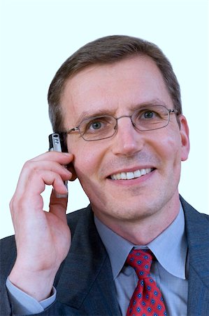 simsearch:400-04608943,k - Middle-aged smiling businessman making a phone call Stock Photo - Budget Royalty-Free & Subscription, Code: 400-04013634