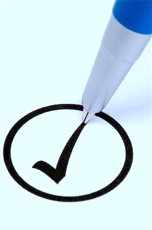 Pencil making a check sign in a circled box. Isolated on white. Fotografie stock - Microstock e Abbonamento, Codice: 400-04013701