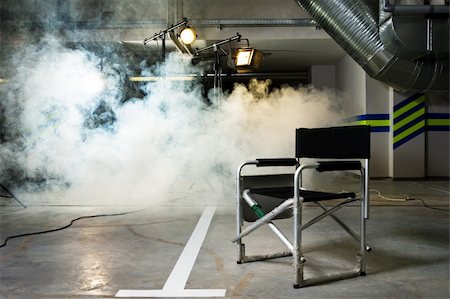 Chair for the director in studio on a background of a smoke Stock Photo - Budget Royalty-Free & Subscription, Code: 400-04024194