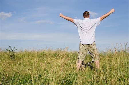 simsearch:400-04450996,k - happy man relaxing at meadow Stock Photo - Budget Royalty-Free & Subscription, Code: 400-04024354