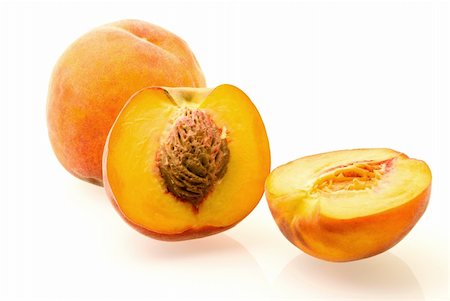 peach slice - fresh ripe juicy peaches over white background Stock Photo - Budget Royalty-Free & Subscription, Code: 400-04024990