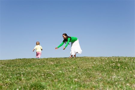 simsearch:400-04612785,k - active family on green meadow Stock Photo - Budget Royalty-Free & Subscription, Code: 400-04025571