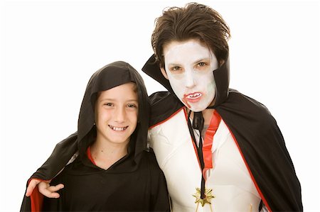 Two adorable boys in their Halloween Costumes.  Isolated on white. Stock Photo - Budget Royalty-Free & Subscription, Code: 400-04025947