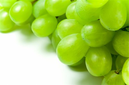 Bunch of green grapes over white background Stock Photo - Budget Royalty-Free & Subscription, Code: 400-04026044