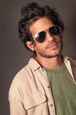Portrait of young hispanic male beauty wearing fashion sunglasses Stock Photo - Budget Royalty-Free & Subscription, Code: 400-04026064