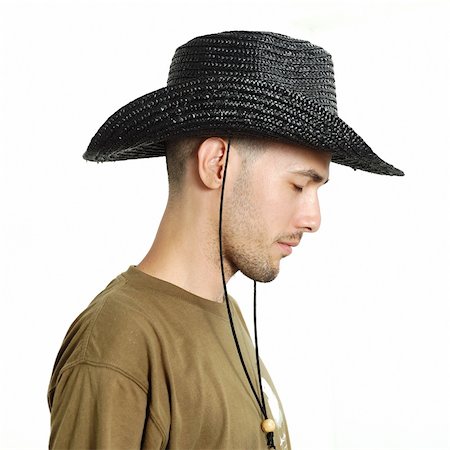 Portrait of young man wearing a hat - isolated Stock Photo - Budget Royalty-Free & Subscription, Code: 400-04026066