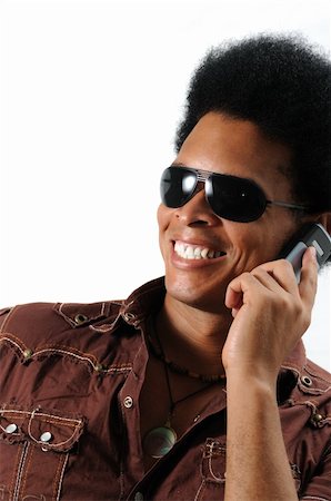 simsearch:400-05753456,k - Portrait of young african male model using cell phone - isolated Foto de stock - Super Valor sin royalties y Suscripción, Código: 400-04026067