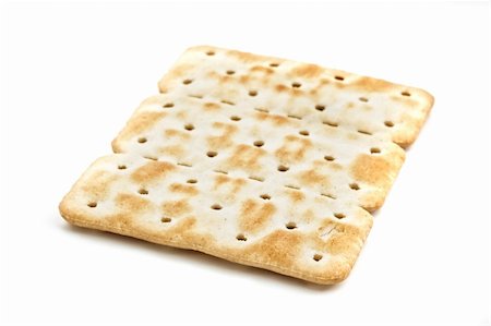 snack cracker white background - Cracker isolated on white background, studio shot. Stock Photo - Budget Royalty-Free & Subscription, Code: 400-04026149