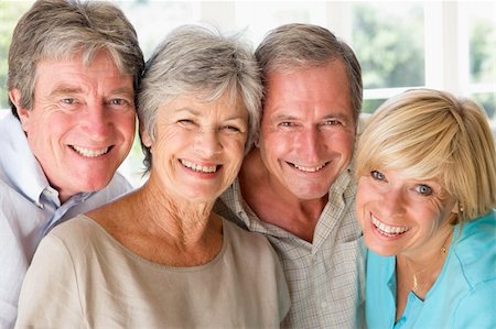 simsearch:400-04890264,k - Two couples indoors smiling Stock Photo - Budget Royalty-Free & Subscription, Code: 400-04026740