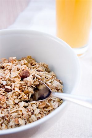 pour milk in cereal - A nice breakfast with cereals and orange juice Stock Photo - Budget Royalty-Free & Subscription, Code: 400-04027339