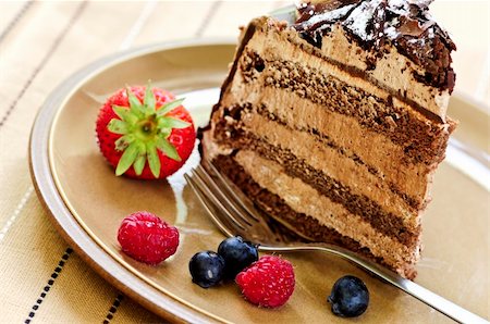 simsearch:400-05695717,k - Slice of chocolate mousse cake served on a plate Stock Photo - Budget Royalty-Free & Subscription, Code: 400-04027589