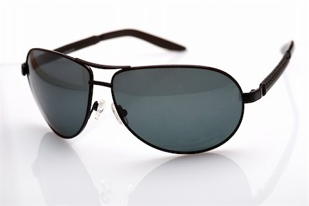 Sunglasses on a light background Stock Photo - Budget Royalty-Free & Subscription, Code: 400-04027723