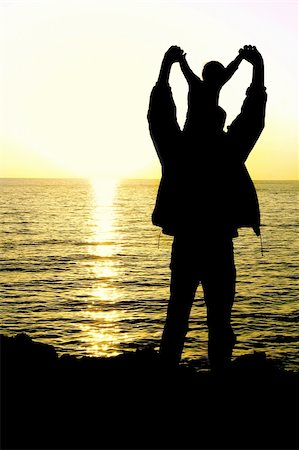 silhouette father and son sunset - father and son at sunset sea Stock Photo - Budget Royalty-Free & Subscription, Code: 400-04027863