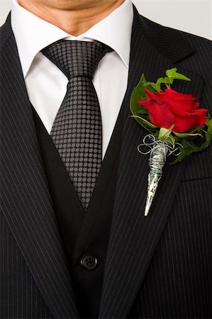red rose on suit jacket of groom Stock Photo - Budget Royalty-Free & Subscription, Code: 400-04028078