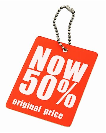 reduced sign in a shop - close-up of a price tag on white, no copyright infringement Stock Photo - Budget Royalty-Free & Subscription, Code: 400-04028418