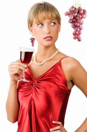 simsearch:400-04629496,k - upscale or stylish lady in red dress with a glass of red wine with glancing eyes Photographie de stock - Aubaine LD & Abonnement, Code: 400-04028677