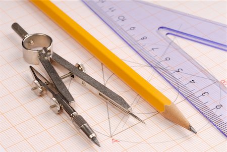 drafting tool - Macro of geometry tools lying on drawing Stock Photo - Budget Royalty-Free & Subscription, Code: 400-04020022