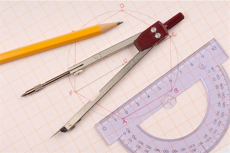 drafting tool - Macro of geometry tools lying on drawing Stock Photo - Budget Royalty-Free & Subscription, Code: 400-04020023