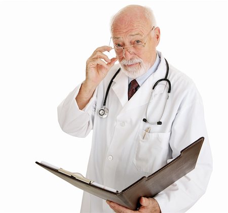 simsearch:400-04217553,k - Serious mature doctor wants to discuss your medical history.  Isolated on white. Foto de stock - Royalty-Free Super Valor e Assinatura, Número: 400-04020227