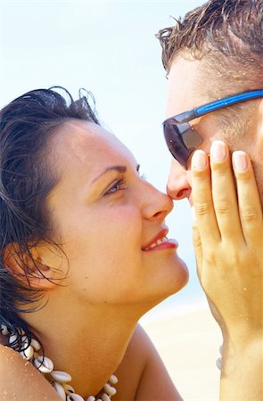 simsearch:400-05227851,k - a portrait of attractive couple having fun on the beach Fotografie stock - Microstock e Abbonamento, Codice: 400-04021178