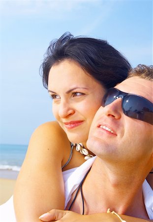 simsearch:400-05227851,k - a portrait of attractive couple having fun on the beach Fotografie stock - Microstock e Abbonamento, Codice: 400-04021186