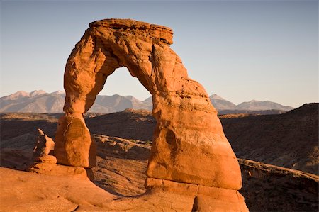 simsearch:400-04470445,k - Delicate Arch at sundown - Rock formation in Arches National Park in Utah, USA Stockbilder - Microstock & Abonnement, Bildnummer: 400-04021456