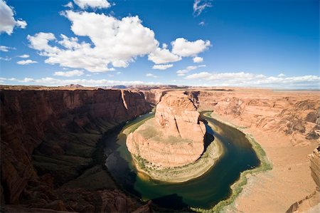 simsearch:400-04060904,k - Azure skies, orange cliffs on emerald waters shimmering Photographie de stock - Aubaine LD & Abonnement, Code: 400-04021465