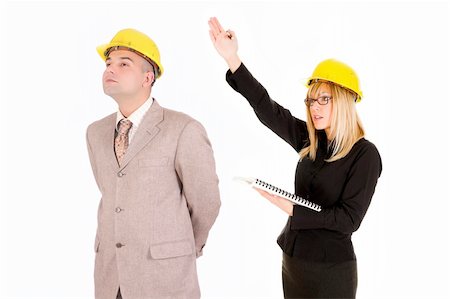 businesswoman and architect looking up on white background Stock Photo - Budget Royalty-Free & Subscription, Code: 400-04021739