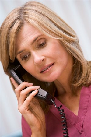 simsearch:400-04021788,k - Consultant phoning client from surgery with bad news Stock Photo - Budget Royalty-Free & Subscription, Code: 400-04021838
