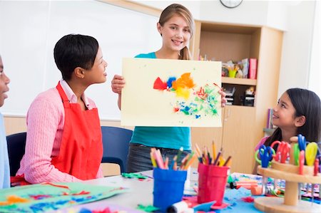 simsearch:400-04036581,k - Elementary school pupil talking about picture in art class Stock Photo - Budget Royalty-Free & Subscription, Code: 400-04023293