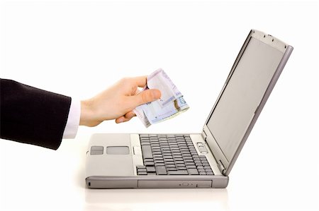 simsearch:400-04416697,k - Paying online: businessman giving cash to the computer Stockbilder - Microstock & Abonnement, Bildnummer: 400-04023394