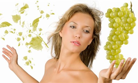 photo of model woman with grapes - pretty and sensual blond girl with a big grape near and some flying leaves grape Stock Photo - Budget Royalty-Free & Subscription, Code: 400-04023818