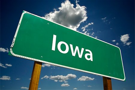 Iowa Road Sign with dramatic clouds and sky. Stockbilder - Microstock & Abonnement, Bildnummer: 400-04023853