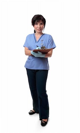 Nurse or doctor in uniform holding medical records. Stock Photo - Budget Royalty-Free & Subscription, Code: 400-04023877