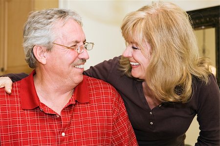 simsearch:400-04109826,k - Happily married mature couple smiling and laughing together. Fotografie stock - Microstock e Abbonamento, Codice: 400-04023959