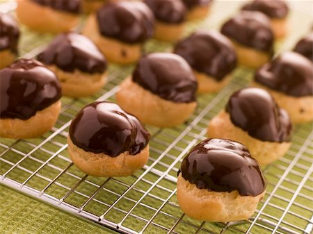 simsearch:400-04043162,k - Chocolate dipped Profiteroles Stock Photo - Budget Royalty-Free & Subscription, Code: 400-04034325