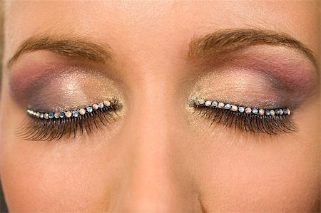 A macro close up of a beautiful woman's make up eye with jewelled false eyelashes Stock Photo - Budget Royalty-Free & Subscription, Code: 400-04034857