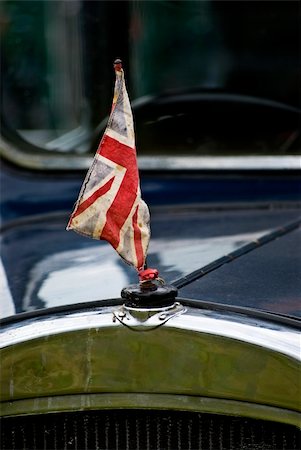 restoring cars - detail of vintage car with tattered British flag Stock Photo - Budget Royalty-Free & Subscription, Code: 400-04034884