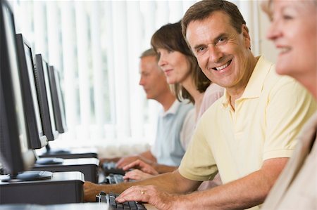 Adult students in a computer lab Stock Photo - Budget Royalty-Free & Subscription, Code: 400-04035172